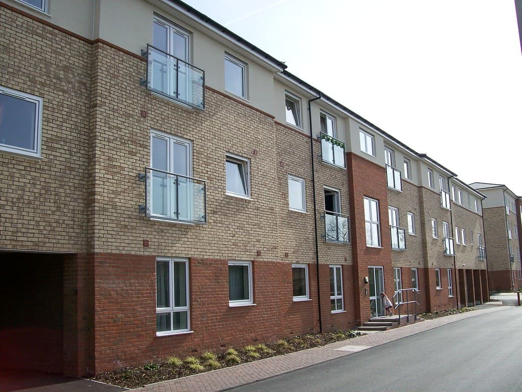 A modern new-build social housing block in England